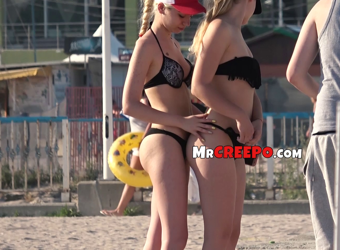 Spying on lesbian teens touching at the beach ~ Mr